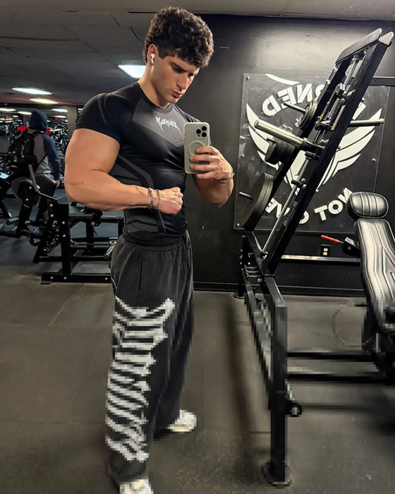 2025 YOUNGAL New Men's Fitness T-shirts clothing sports Tshirt tights high elastic training short sleeve fitness man clothing